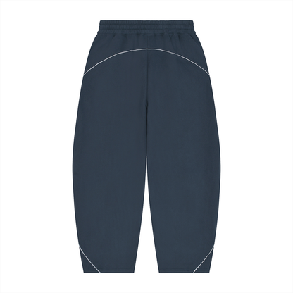 Navy blue piping sweatpants, back view