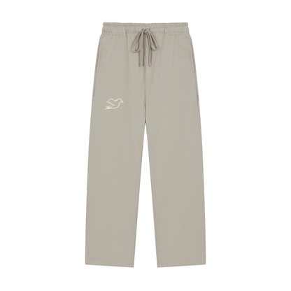 Light gray heavyweight pants with Auspex bird at the hip, front view