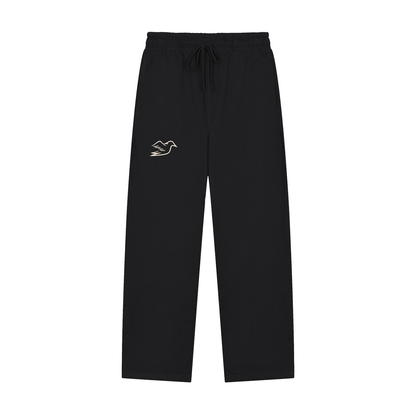 Black heavyweight pants with Auspex bird at the hip, front view