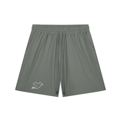 Gray stretch shorts with Auspex bird on the leg, front view