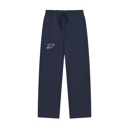 Navy blue heavyweight pants with Auspex bird at the hip, front view